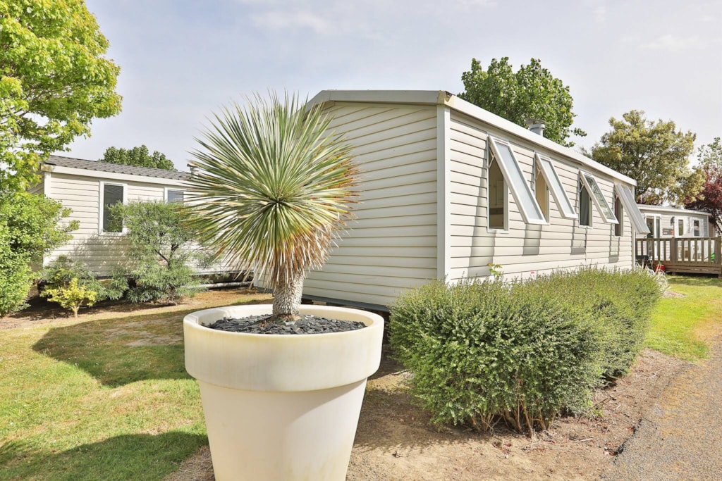 Stacaravan Comfort 34m² | 3 slaapkamers | Enig terras