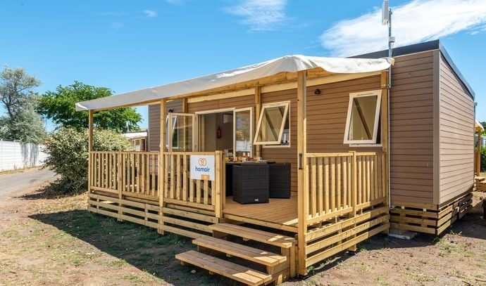 Stacaravan Premium 32m² - 3 slaapkamers - airconditioning - loungeterras -